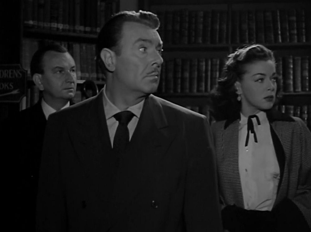 Clive, John and Stella search the basement for clues in Man Bait.